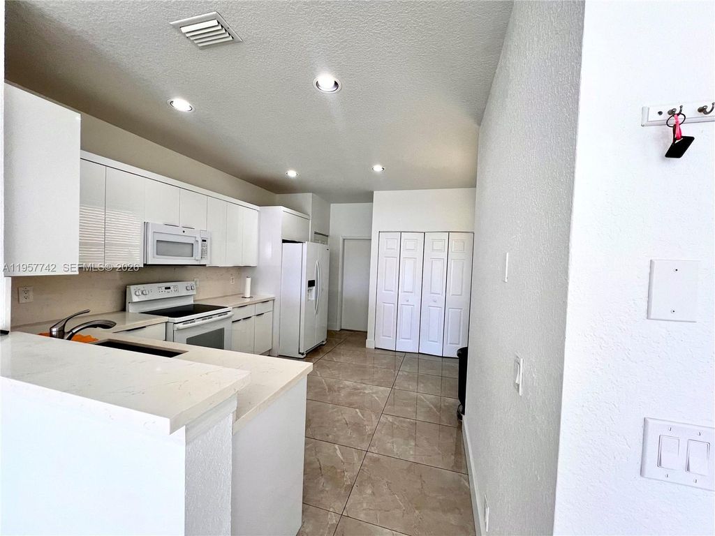 Photo of 2433 Pasadena Way, Weston, FL 33327 (MLS # A11957742)