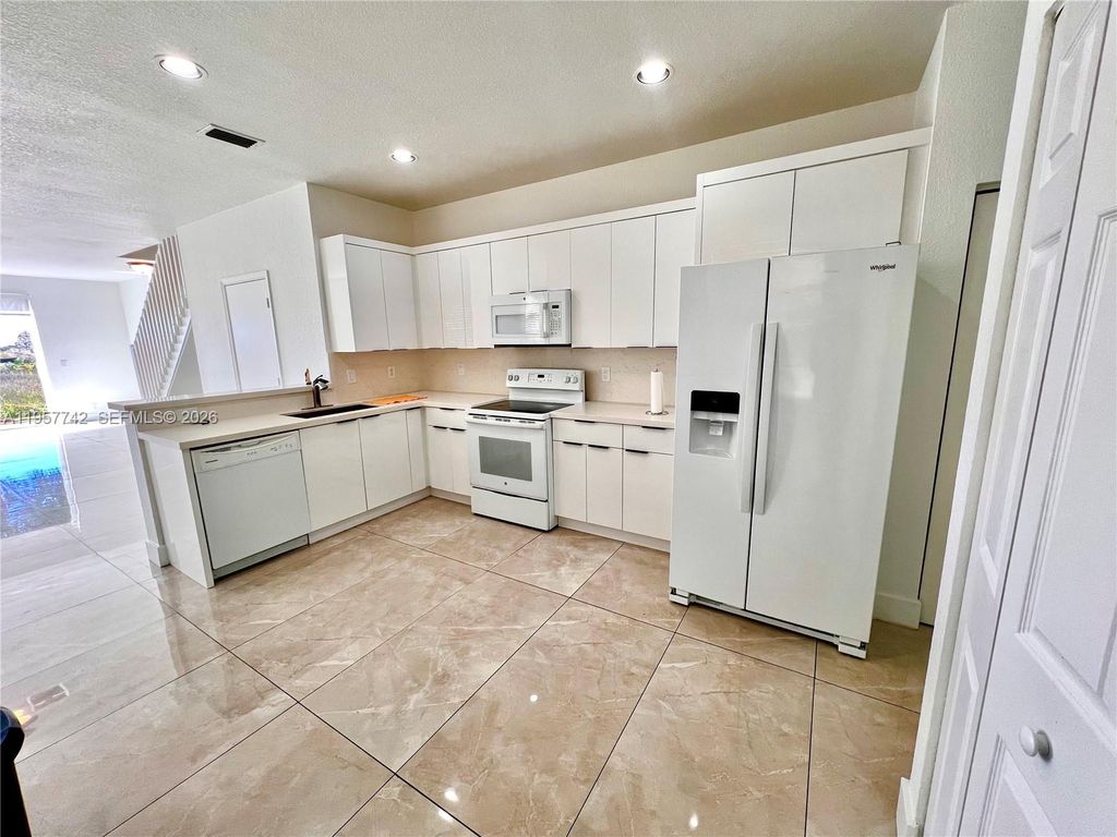 Photo of 2433 Pasadena Way, Weston, FL 33327 (MLS # A11957742)