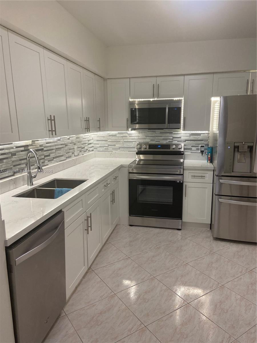 Location Location just a few minutes away from the beach. Ground Floor Beautiful 2 bedrooms 2 Bath Condo in the heart of Hallandale beach. Completely Remodeled kitchen. Tennis court, Community pool, sauna.
Building requires association approval. Well maintained and updated building with walking distance to shopping, dinning, Gulfstream. Basic Cable included. All ages welcome!!