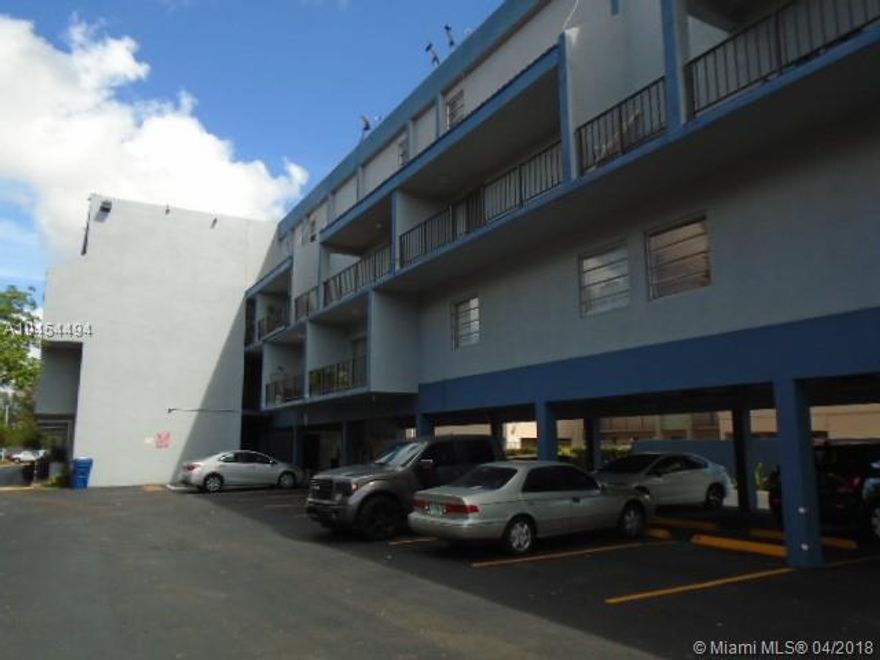 Move in ready!  Spacious 2 bedroom, 1.5 baths.  Tile and wood floors throughout.  Galley style kitchen with cream tone cabinets, bright white appliances and faux granite counter tops.  Large living room area and open balcony area.  Spacious master bedroom and bath.  Great locations.  Enjoy the community amenities.  Close to schools, shopping and entertainment.