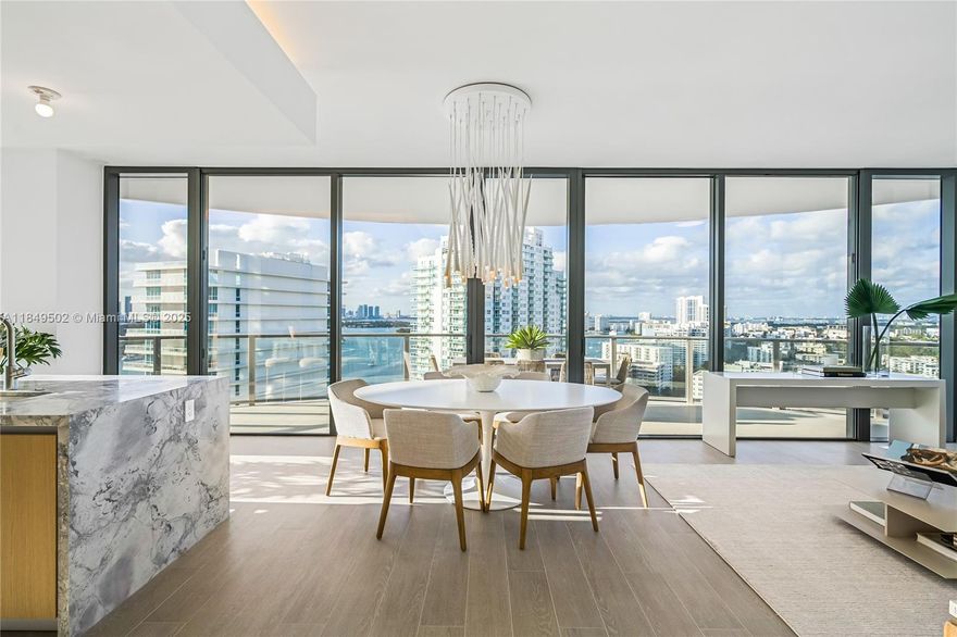 This sophisticated two-bedroom, two-and-a-half-bath corner residence at Five Park offers sweeping views of the ocean, Biscayne Bay, and Canopy Park. With floor-to-ceiling windows and north-facing exposure, it features porcelain floors, a gourmet kitchen with Gaggenau appliances, and Italian cabinetry. Both bedrooms have en-suite baths, plus a stylish powder room. Enjoy a bayfront pool, 24-hour fitness and co-working studios, spa, on-site restaurant, and exclusive beach club access in South of Fifth with dedicated chairs, umbrellas, and food and drink service.