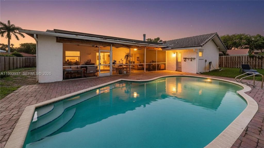 Photo of 251 NW 92nd Ave, Coral Springs, FL 33071 (MLS # A11993937)