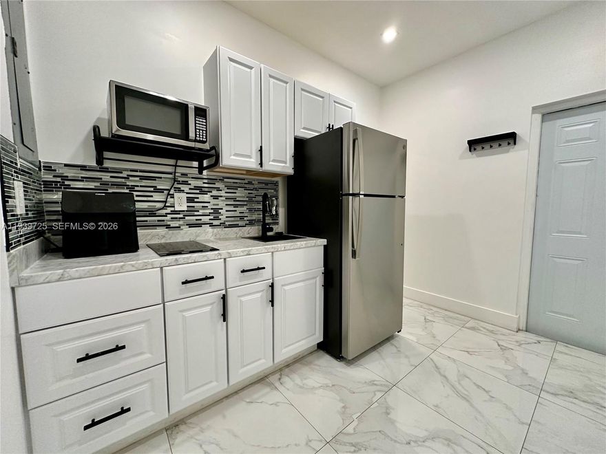 Discover comfort and convenience in this cozy, fully renovated studio featuring a sleek kitchenette, elegant tile flooring, and a spacious closet for effortless organization. The modern bathroom offers stylish finishes, while the private entrance ensures added privacy and independence. Enjoy access to a shared patio perfect for relaxing outdoors, plus an on-site washer/dryer for everyday ease. All utilities included (Water, power, internet) Move-in ready!