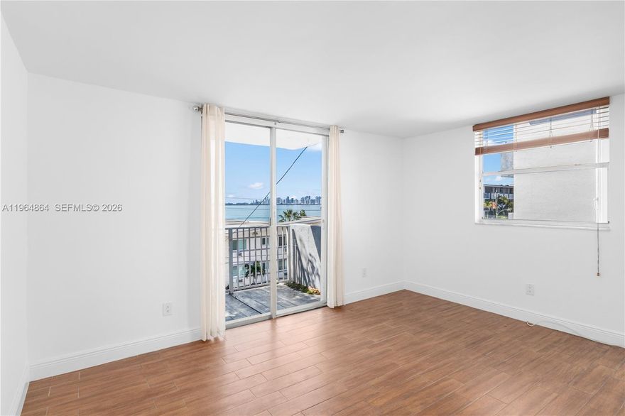 Bright 2-bedroom, 2-bath corner condo with abundant natural light, peaceful water views, and two balconies. Features include in-unit washer and dryer, tile flooring, stainless steel appliances, ample closet space, and one assigned parking space. Located in a walkable neighborhood with a top-rated school just steps away, along with parks, groceries, and the upcoming youth soccer academy. Well-maintained building with tropical pool and fitness center. Located in North Bay Village, a hidden-gem island between Miami Beach and Miami with exciting new luxury developments underway.