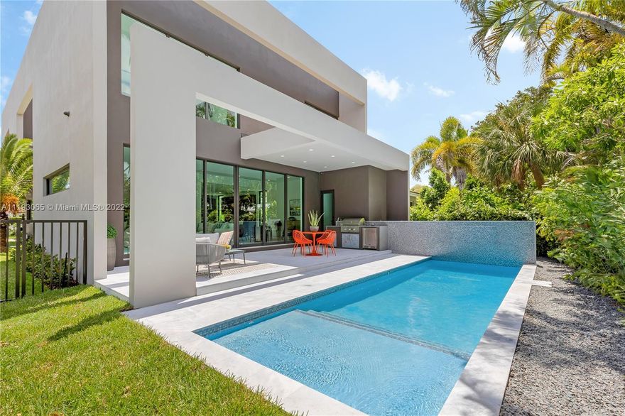 NEW PRICE! Urban living at its best! Unique 5Bed/6Bath, brand new construction, modern house in the heart of North Coconut Grove! Meticulously built with top of the line finishes. Perfect for the most discerning buyer. 4 bedrooms & 4 bathrooms upstairs & 1 bedroom with full bathroom on the 1st floor plus a 6th full (cabana/guest) bathroom. Open kitchen with sleek Italian cabinetry with island wrapped-around dining table. High-end appliances, plumbing, bathroom fixtures and closet cabinetry throughout. LED lighting, Ethernet wired, alarm system w security cameras. Fabulous outdoor entertaining with expansive covered terrace featuring a well equipped summer kitchen and pool. Luscious landscaping (w sprinkler system) includes palms and trees plus perimeter fence for plenty of privacy.