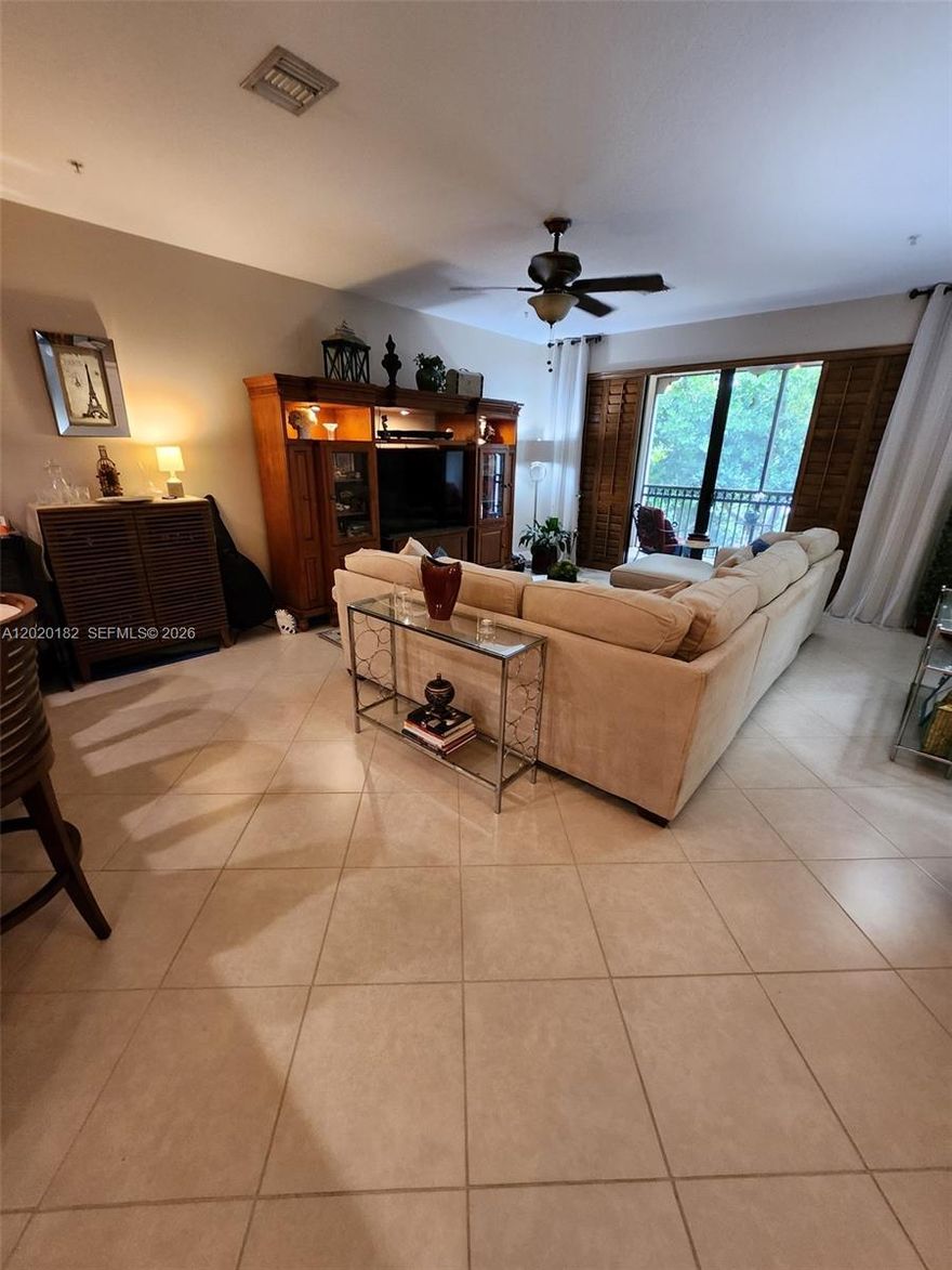 Elegant and spacious corner unit features a split 2 bedroom/2 bath design.  The open kitchen features newer high-end LG black stainless steel appliances, granite countertops and a cozy dining area.  Ceiling fans throughout and Plantation Shutters on the living room windows.  Tastefully decorated and well maintained.  Master bathroom features dual sinks, a roman tub and a separate  shower.  Community resort style amenities include a state-of-the-art fitness center, tennis & pickle ball, sauna, indoor basketball court, fiber optic Wi-Fi, 3 pools & much more! Best priced upgraded unit on the market in Artesia which has close proximity to Sawgrass Mills and Amerant Bank arena.   All special assessments are paid in full!  This is a MUST SEE!