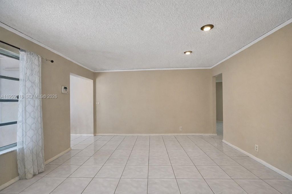 Photo of 4927 NW 55th Ct, Tamarac, FL 33319 (MLS # A11959318)