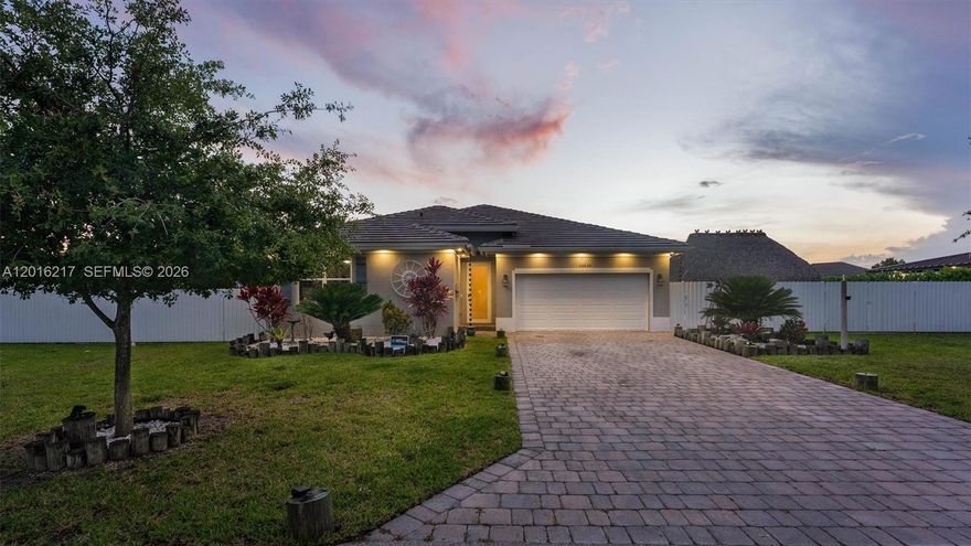 Exceptional 4-bedroom, 3-bath Next Gen residence offering the perfect blend of modern luxury, comfort, and functionality. This beautifully upgraded home features an open-concept layout with impact windows and doors throughout, providing style, natural light, and peace of mind. The spacious design is ideal for entertaining and multigenerational living.

Step outside to your private backyard oasis featuring a heated saltwater pool and jacuzzi, perfect for year-round enjoyment. Situated on an oversized 17,000 sq. ft. fully fenced lot, this property offers rare flexibility with ample space to park a boat, RV, trailers, or multiple vehicles.

Enjoy the freedom of no HOA and no CDD fees while still being conveniently located near shopping, dining, schools, parks, and major highways. Whether you are looking for privacy, space, or the ultimate South Florida lifestyle, this turnkey property delivers it all. A rare opportunity to own a move-in ready home with luxury features and unmatched outdoor space.