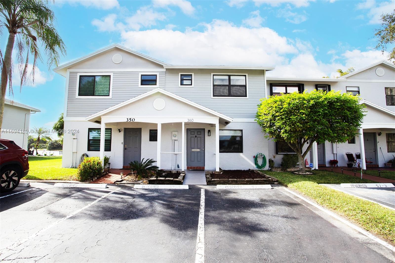 Lakeview and totally updated townhouse in the heart of Pembroke Pines. This 2/2.5 property also features a dedicated office space, ideal for working from home. The entire townhouse boasts modern touches, including laminated floors, impact windows, motorized blackout blinds in the bedrooms, new AC (2023) and 2 assigned parking spaces. The updated kitchen is equipped with stainless steel appliances.
Enjoy the peaceful lake view from your backyard or take advantage of the community’s amenities, as a pool, tennis court, playground, and 24/7 security patrols. HOA fees cover internet, cable TV, and roof maintenance (replaced in 2022).
Great location close to everything!. Just minutes from Pines Boulevard, and Pembroke Lake Mall, and with easy access to major highways.