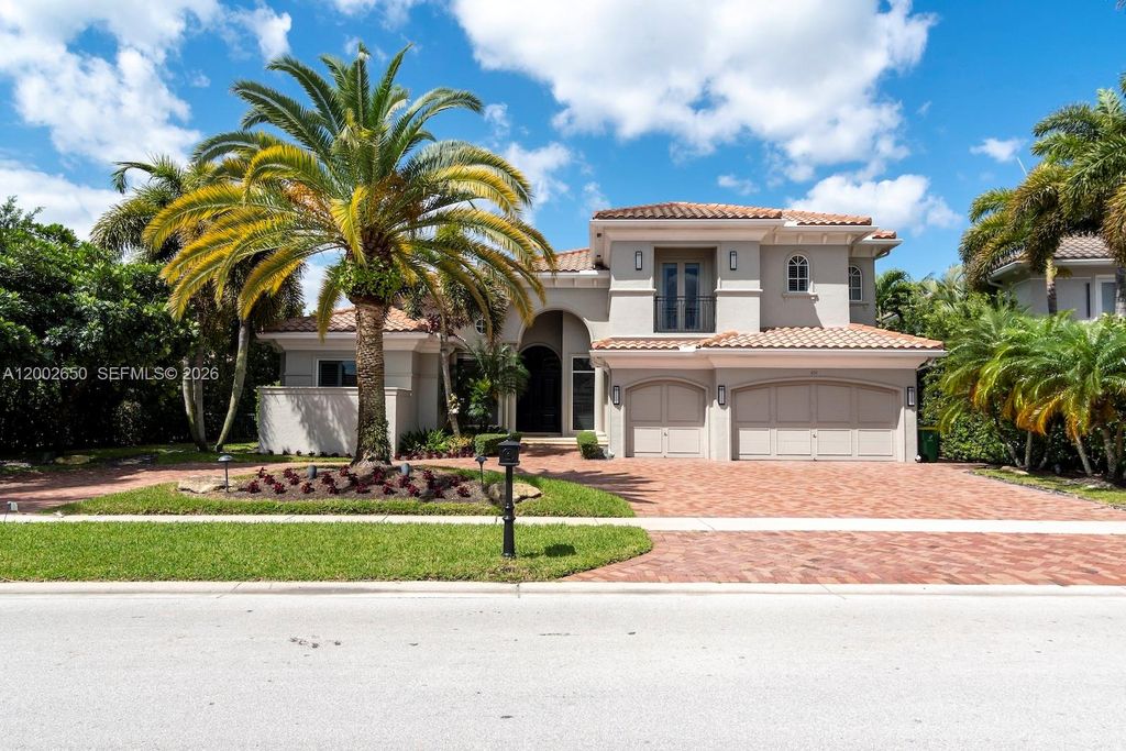 Photo of 651 Sweet Bay Ave, Plantation, FL 33324 (MLS # A12002650)