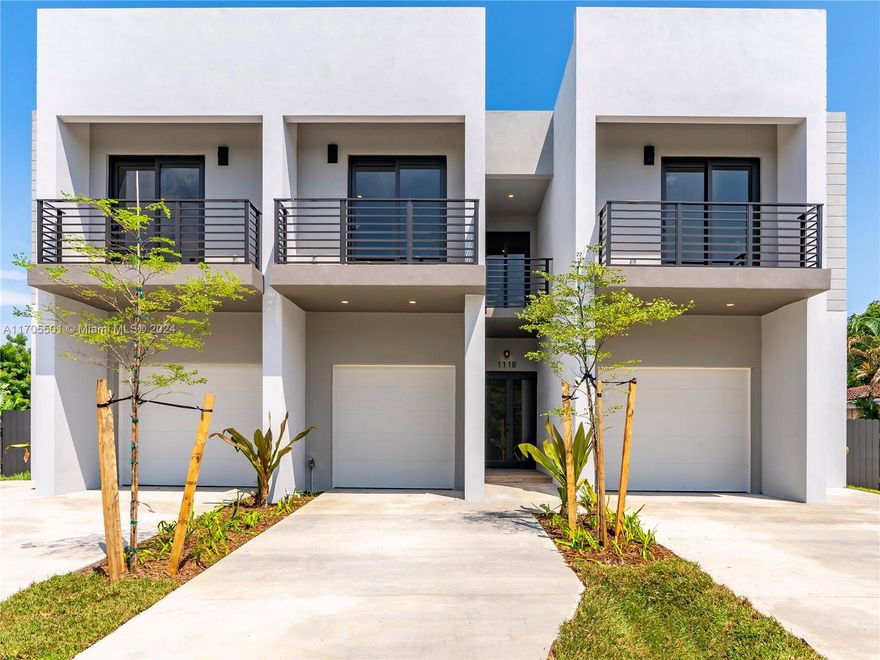 Stylish, contemporary and move-in ready townhouse in the heart of Fort Lauderdale. Three bedroom suites, 2.5 bath, spacious living area and an attached one car garage. All concrete with beautiful porcelain and wood vinyl floors, high ceiling, linear air vents and all hurricane impact windows and doors. Kitchen is equipped with top of the line stainless steel appliances, quartz counter top and a spacious island. Private outdoor space includes a patio and a fenced backyard. HOA fee includes landscaping, common area irrigation line maintenance and premises liability insurance. Close to shopping, dining, schools and parks. Few minutes drive to US1 and I95.