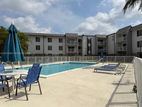 Photo of 5201 NW Geneva Way #103, Doral, FL 33166 (MLS # A12015389)