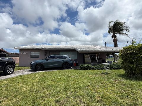 Photo of 2490 NW 12th Ct, Pompano Beach, FL 33069 (MLS # A12023965)