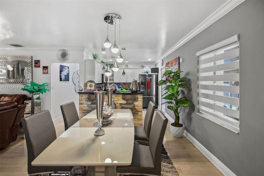 This is a meticulously maintained single-family home with no HOA and an incredible backyard space perfect for gatherings, just like we love in Miami! The outdoor area is beautifully crafted with top-notch materials and workmanship, always kept spotless and ready to impress. Even if above-ground pools aren’t your thing, this one might change your mind. The photos don’t do this property justice. Inside, what was once three bedrooms has been converted into two larger, more comfortable rooms, with space on the lot for future expansion. The home features impact windows, accordion shutters, and a roof from 2018.  The roof and soffits are cleaned and painted annually. Elevated and not in a flood zone, it’s insurance-friendly too!  Separate laundry room.  Storage shed stays.