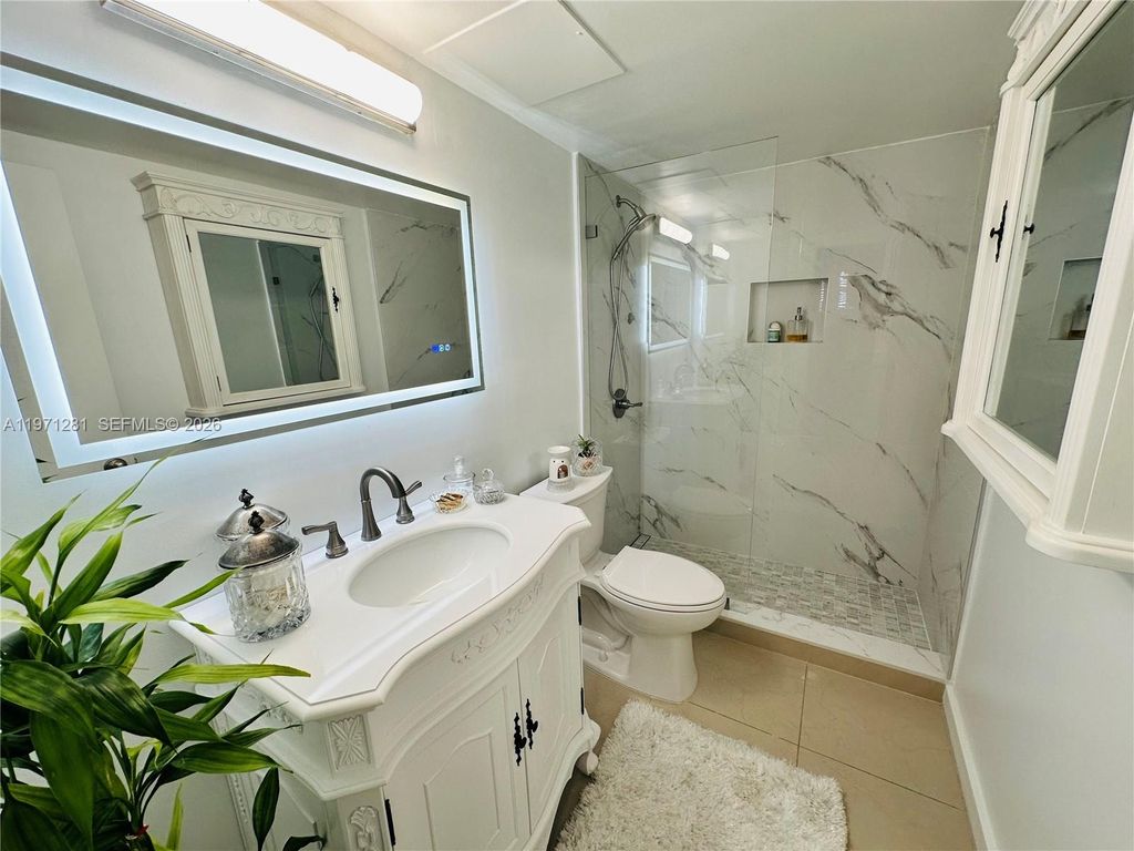 Photo of 301 Golden Isles Dr #114, Hallandale Beach, FL 33009 (MLS # A11971281)