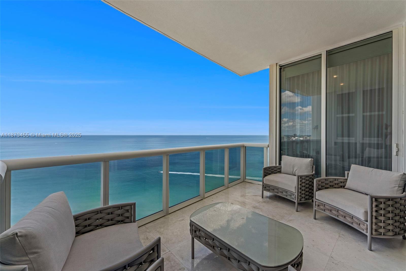 WOW!!! TOTALLY RENOVATED! EVERYTHING IS BRAND NEW! BEAUTIFUL!! DIRECT OCEAN VIEWS FROM THIS 2 BEDROOM & 2.5 BATHS LUXURIOUS RESIDENCE. BEAUTIFUL MARBLE FLOORS, MODERN DESIGNER KITCHEN! ELECTRIC SHADES! TOTO TOILETS TOO. ENJOY ALL THE RESORT STYLE AMENITIES FORM HTIS 5 ACRE RESORTINCLSUING MULTOPLE SWIMMING POOLS, RESTAURANTS, TENNIS, SOCCER, RESORT STYLE FOOD & BEVERAGE SERVICE AT THE BEACH & POOLS. GATED SECURITY. FURNITURE IS NEGOTIABLE. WILL NOT LAST!!