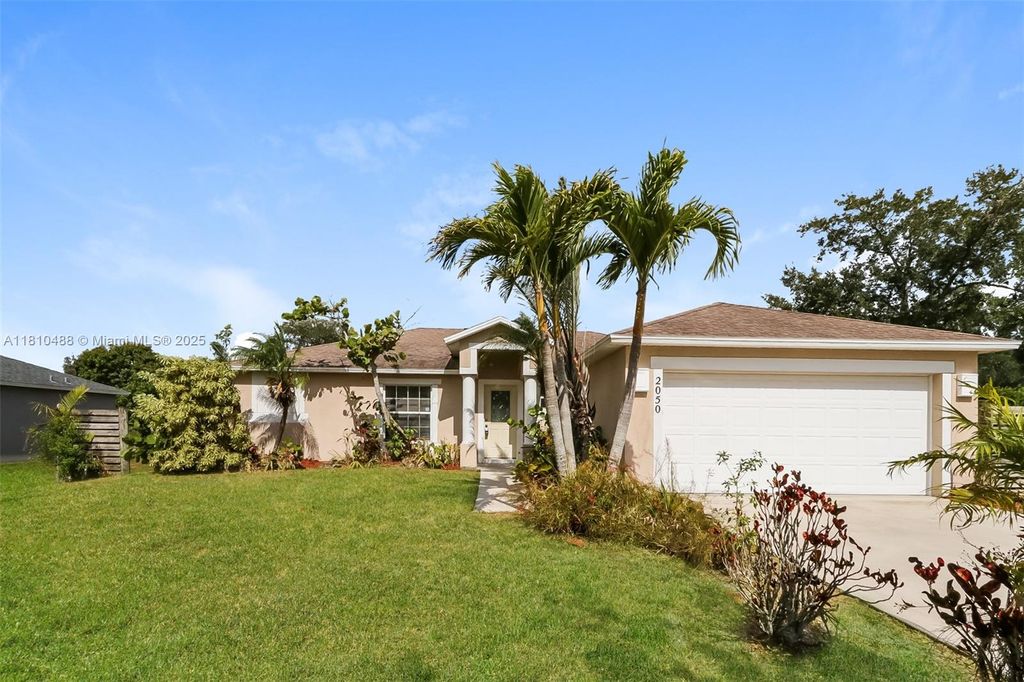 Photo of 2050 SE Crystal Mist St, Port Saint Lucie, FL 34983 (MLS # A11810488)