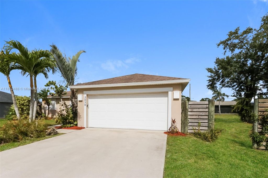 Photo of 2050 SE Crystal Mist St, Port Saint Lucie, FL 34983 (MLS # A11810488)