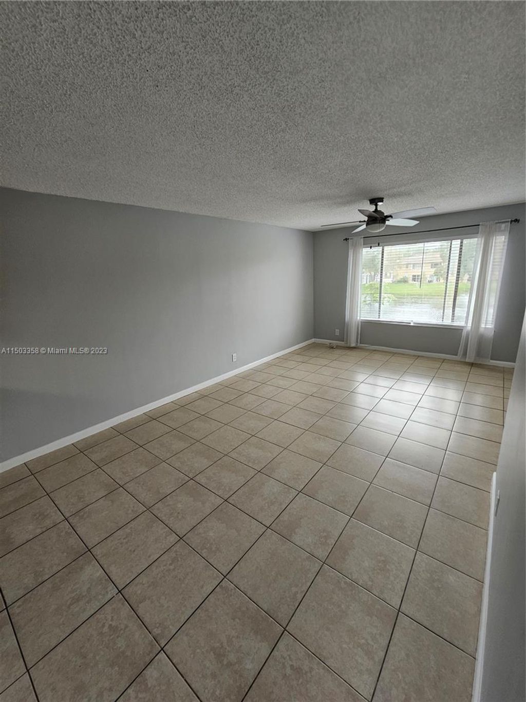 Photo of 9946 Twin Lakes Dr #7-N, Coral Springs, FL 33071 (MLS # A11503358)