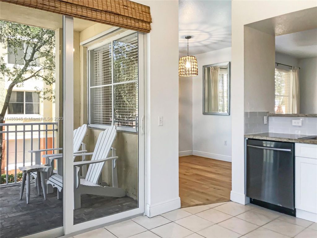 Photo of 11018 Legacy Dr #204, Palm Beach Gardens, FL 33410 (MLS # A11486946)