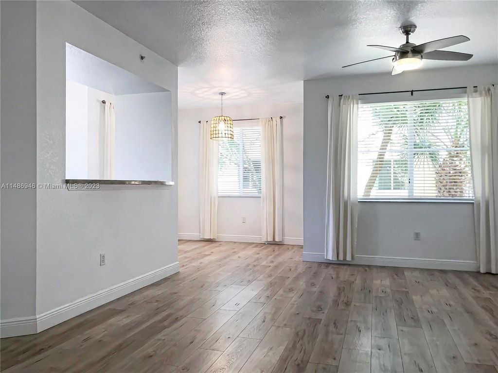 Photo of 11018 Legacy Dr #204, Palm Beach Gardens, FL 33410 (MLS # A11486946)