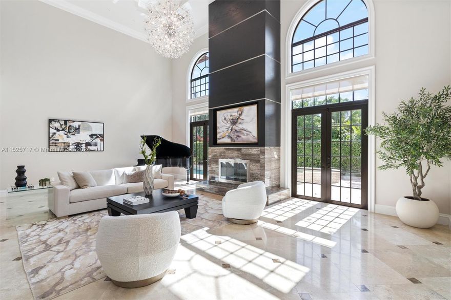 Welcome to this exceptional residence situated in the highly sought-after Coral Ridge neighborhood. Spanning 6,780sf under air, this home offers 6 bedrooms and 6 fulls baths, providing ample space for luxurious living. The 2-story foyer and living room exude grandeur, while the modern chef's kitchen is a culinary delight. An expansive primary suite features a seating area with an adjoining area that can be transformed into an in-home gym, private den, or office, offering versatility to suit your lifestyle. Unwind and relax outside by the pool or under the shaded pergola; an inviting space for relaxation and entertainment. Explore nearby beaches or indulge in world-class dining and shopping. Located in the A+ Bayview School district and close to FLL airport. Reach out to schedule a tour.
