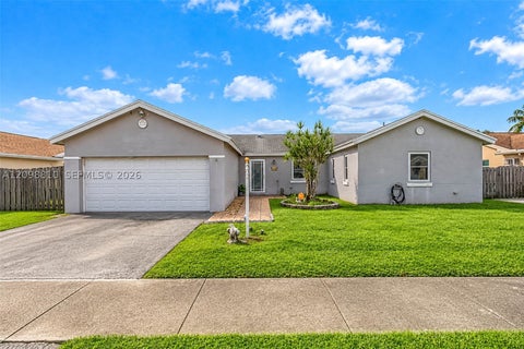 Photo of 9528 NW 53rd St, Sunrise, FL 33351 (MLS # A12098810)