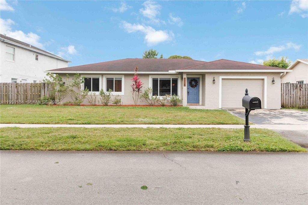 Photo of 9908 NW 46th Ct, Sunrise, FL 33351 (MLS # A11931104)