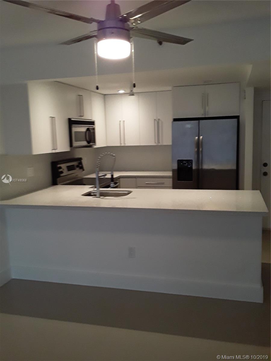 Amazing remodeled 1/1 in the gated community of Greenwich in North Miami. Upgraded kitchen with stainless steel appliances,new cabinets and counter tops. Tile flooring throughout the unit and spacious bedroom with walk in closet. Bathroom has new vanity and tub. Secured building with assigned parking. Laundry is located on every floor. Excellent location behind the Whole Foods on Biscayne Blvd. Centrally located to downtown Miami, South Beach and Aventura.
