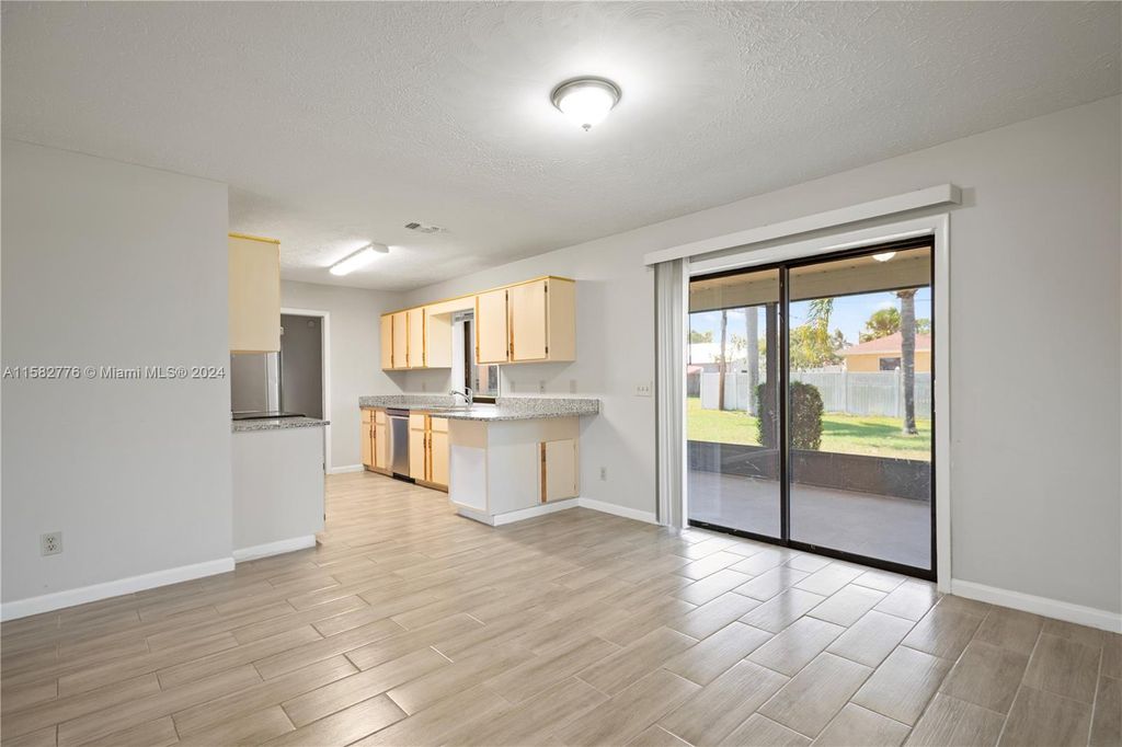 Photo of 2405 SW Falcon Cir, Port Saint Lucie, FL 34953 (MLS # A11582776)