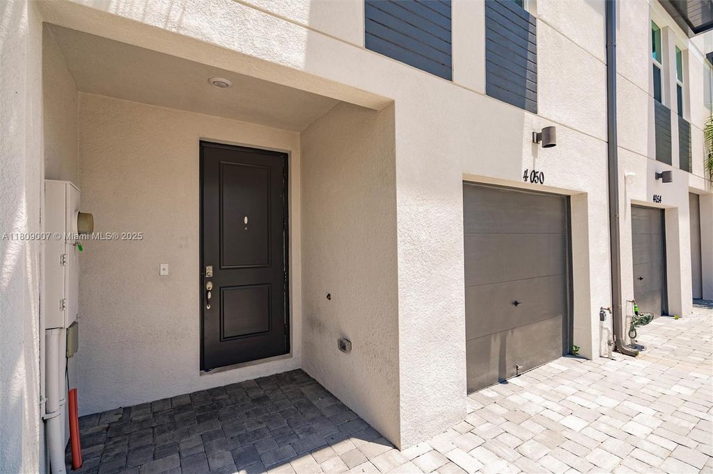 Photo of 4050 Hot Springs Ave, Palm Springs, FL 33461 (MLS # A11809007)