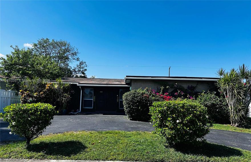 Welcome to 8600 NW 25th Court — a refined single-story residence nestled in the heart of Sunrise, where comfort meets timeless style. This elegant three-bedroom, two-bath home blends modern upgrades with classic charm, offering a bright, open layout for both relaxing and entertaining.

Elegant 3-bed, 2-bath single-family home in Sunrise — no HOA and beautifully updated throughout. Features include a new Carrier AC (2021), hurricane impact windows and doors, new white PVC fence, EV charger, semicircular driveway and fully paved back garden. Enjoy an open layout with wood and tile floors, LED lighting, retractable fans, and energy-efficient gas appliances. A rare blend of style, comfort, and modern convenience.