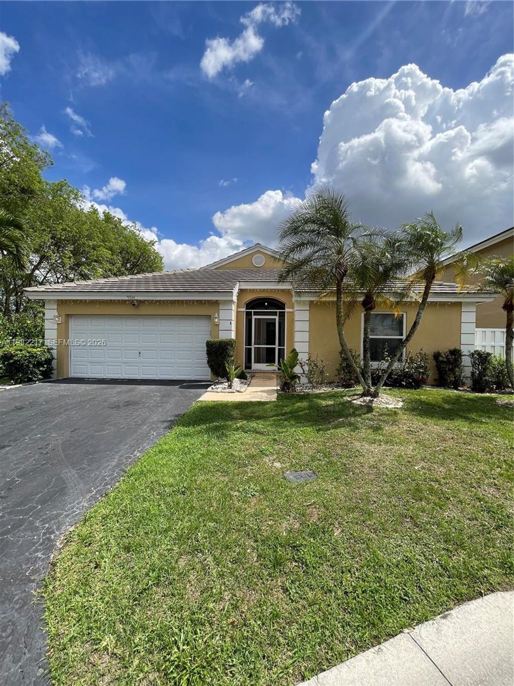 Photo of 5544 NW 54th Cir, Coconut Creek, FL 33073 (MLS # A11982217)