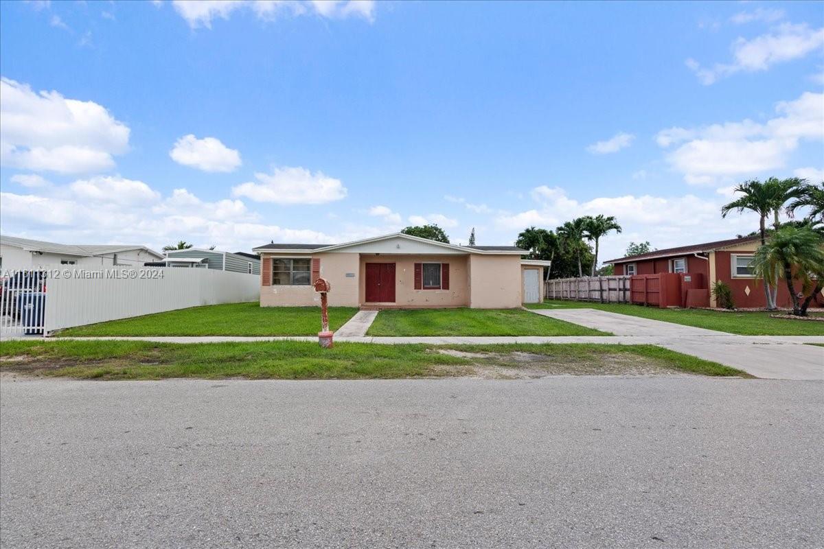 Unveil the possibilities with this 4-bedroom, 2-bathroom fixer-upper located in Homestead. Perfect for DIY enthusiasts or investors, this property features distinct family and formal living spaces, no HOA or CDD fees, and ample land for a pool, a spacious patio, or parking for recreational vehicles and boats. Situated close to Florida's Turnpike, enjoy convenient access to both Miami and the Florida Keys. With a need for updates to meet financing and insurance criteria, this home is ready for your customization. An excellent opportunity for those ready to tailor a space to their needs or capitalize on investment potential.  CASH or 203k ONLY - Roof is past it's life expectancy but water tight and exterior has peeling paint.  Decision makes, must see the property prior to making a offer.