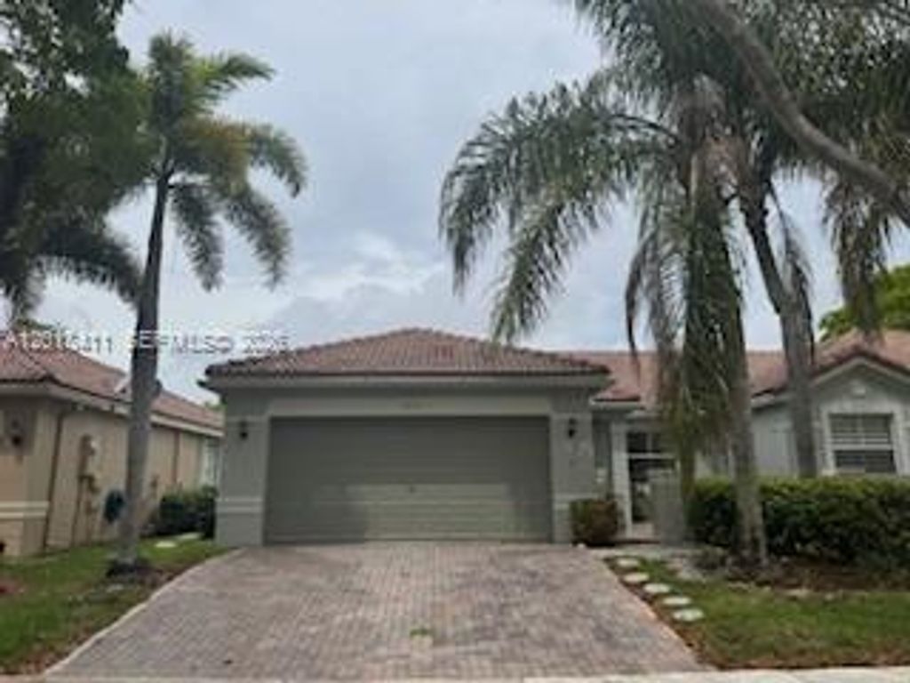 Photo of 1931 Pisces Ter, Weston, FL 33327 (MLS # A12013411)