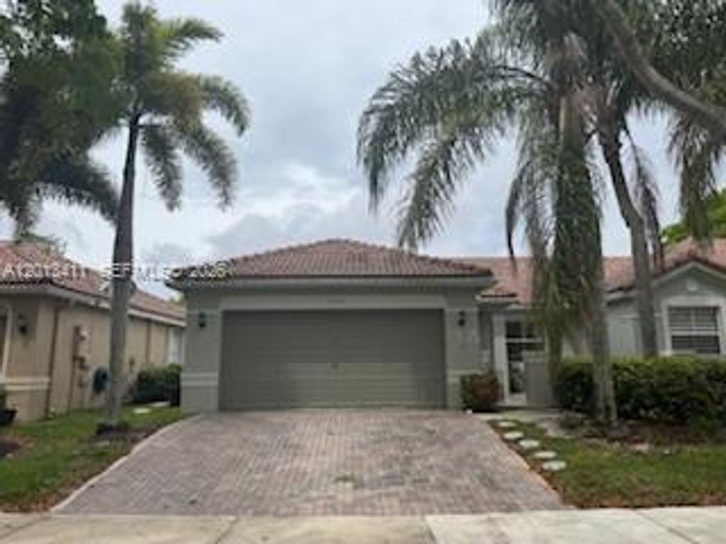 Photo of 1931 Pisces Ter, Weston, FL 33327 (MLS # A12013411)