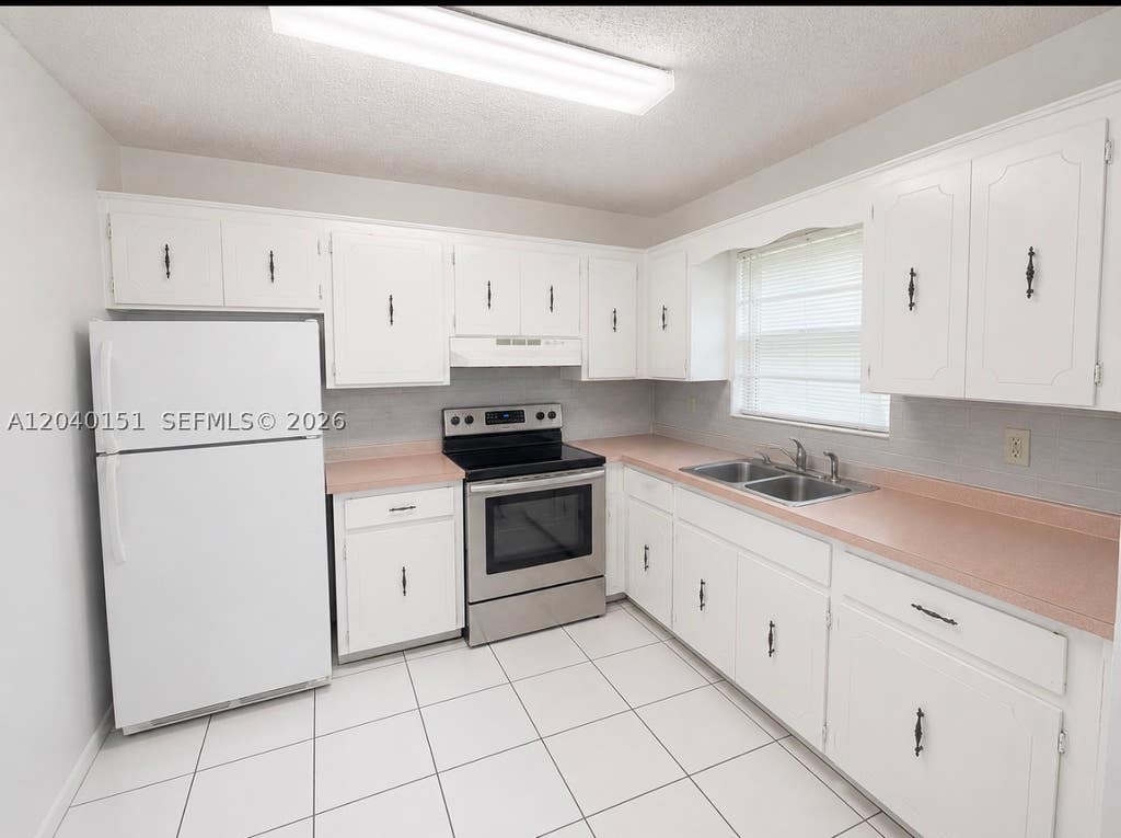 Photo of 5771 SW 36th Ct #301, Davie, FL 33314 (MLS # A12040151)