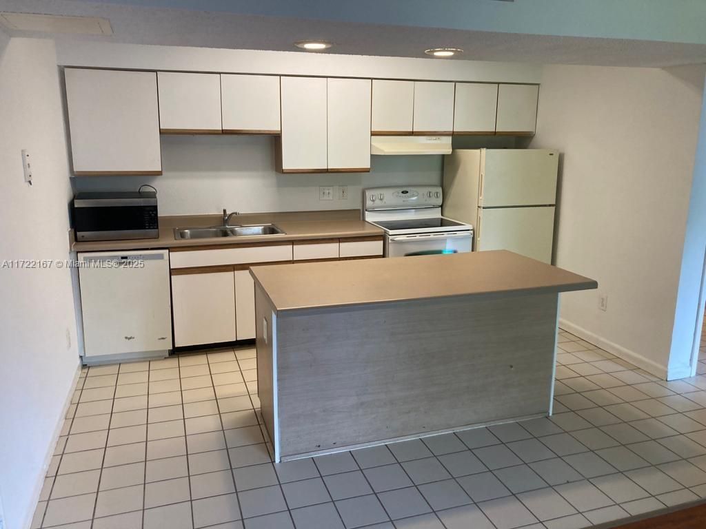 Photo of 3985 W Mcnab Rd #A111, Pompano Beach, FL 33069 (MLS # A11722167)