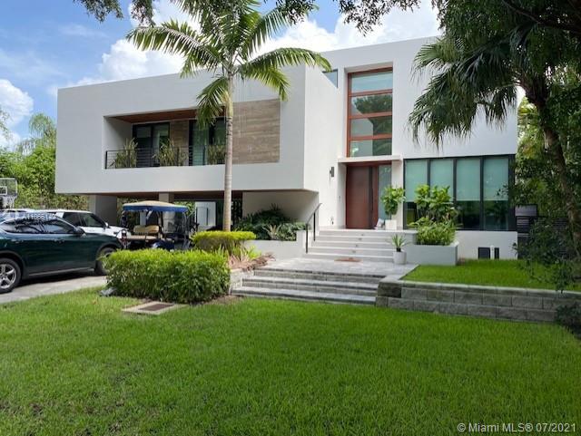 Unique 2 story contemporary home w/ 6 bedrooms, 7.5 baths including maid's room, 2 balconies. High ceilings, marble and engineered wood floors. German cabinetry, state of the art gourmet kitchen with Monogram appliances. Wood doors, floor to ceiling impact windows and top of the line fixtures throughout the house.
Professionally landscaped, 2 car covered parking. Private pool with deck/patio.