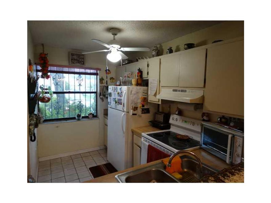 Spacious rarely available lakefront townhouse in Kendall. Covered patio perfect for BBQ. Upstairs balcony facing the lake. Includes appliances.