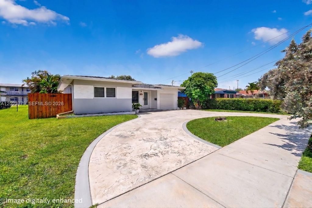 Photo of 709 NW 9th Ct, Hallandale Beach, FL 33009 (MLS # A12023779)