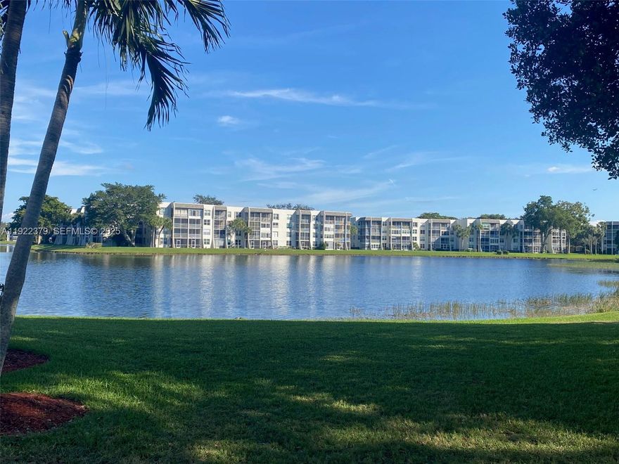 The move-in ready, pristine, property you've been looking for is finally here! Check out this beautiful 2/2 Lake view condo. All stainless steel kitchen appliances, marble bathroom floors, a new roof, newer AC and water heater. With a new electric panel installed 8/25. All of the amenities you've been dreaming of. You can use any of the three pools, play golf, or the gym at no additional cost. To make a deal even sweeter-the seller will pay the remainder of the 40 year special assessment at closing. Did I mention the A-rated schools in the neighborhood? Don't miss out! Please note, an additional special assessment, expected to begin in August 2026, is estimated at approx. $5,000 and will fund the renovation of the elevators and pavements.