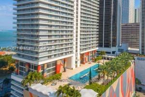 Amazing breathtaking views can be enjoyed from the living room & terraces from this FULLY FURNISHED 2 bed / 2 bath + Den condo, while panoramic windows turn the beautiful seascape into an integral part of the interior. Spacious living & dining area, gourmet kitchen with all S/S appliances. Best common areas in the downtown area. Located just minutes from Brickell, Midtown, South Beach and Airport.