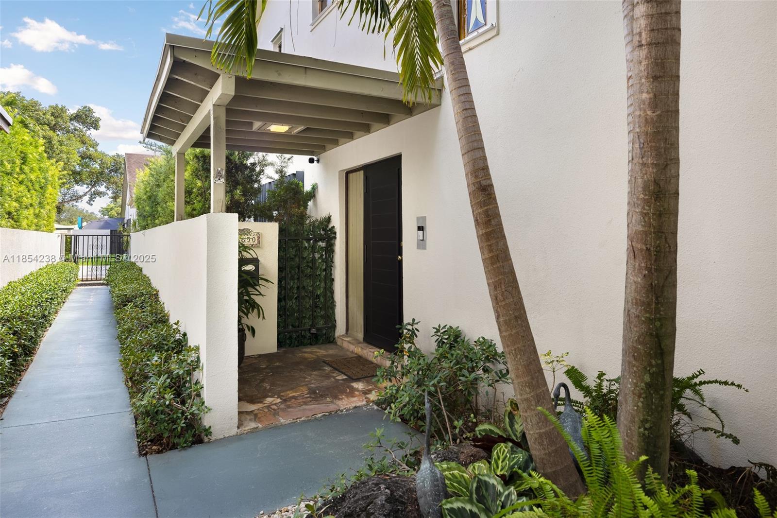Tucked in the coveted Banyans of South Miami, this spacious 3-bed, 3-bath townhome offers 2,200 SF of flexible living space in one of Miami’s most desirable neighborhoods. Surrounded by top-rated schools and just moments from UM, South Miami Hospital, and major expressways, the location is unmatched. The open layout includes a formal living and dining area, generous kitchen, and a large family room with full bath and walk-in closet. Enjoy two outdoor spaces—perfect for entertaining—plus a shaded backyard and front porch. Features include impact glass, a 1-car garage, assigned parking, community pool, tennis courts, and gazebo. Condo fee covers roof, insurance, and more. This is a rare chance to reimagine your dream home in a community poised for growth near the reimagined Sunset Place.