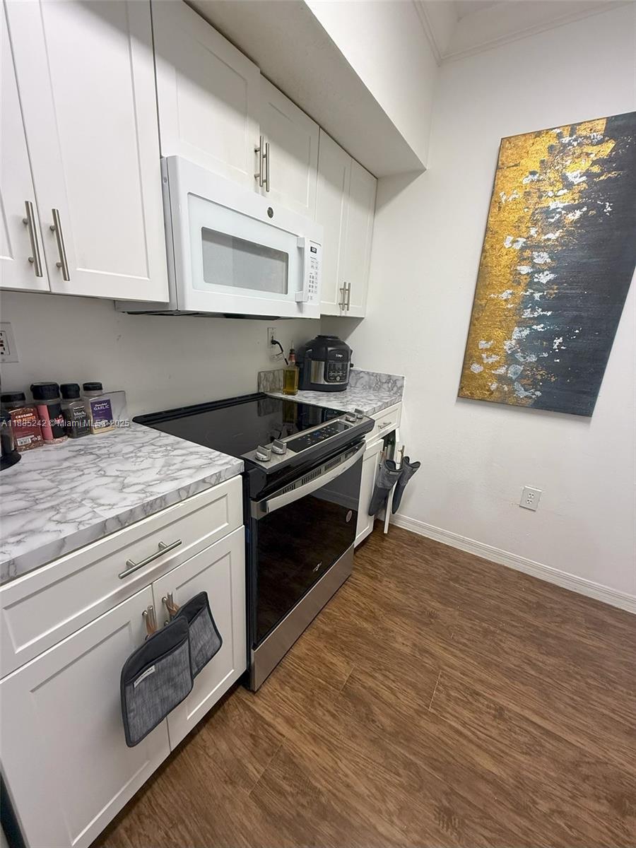 Beautiful and cozy apartment in The Marquesa Mediterranean Resort Style community in the heart of Pembroke Pines. Spacious and Bright unit with 2 split bedrooms and 2 bathrooms located in the first floor. Carpet Floors, brand-new Refrigerator, Washer and Dryer. Big balcony. Gated Community with Swimming Pool, Sundeck, Tropical Landscaping, Indoor Racquetball Court, Equipped Gym, Elegant Clubhouse, Children’s Playground, Theater Room, BBQ/Picnic Area, Car Wash Facility. Conveniently located across from "Pembroke Lakes Mall" and a lot of shopping centers, Restaurants and A+ Schools. Close to CB Smith Park and Memorial Hospital. NEW A/C August 2025.