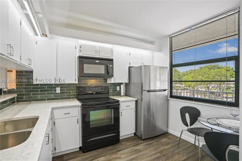 Photo of 3516 Whitehall Dr #301, West Palm Beach, FL 33401 (MLS # A12052766)