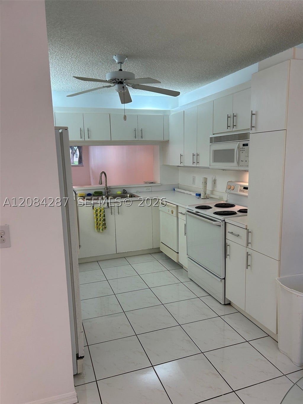 Photo of 2541 N Nob Hill Rd #109, Sunrise, FL 33322 (MLS # A12084287)