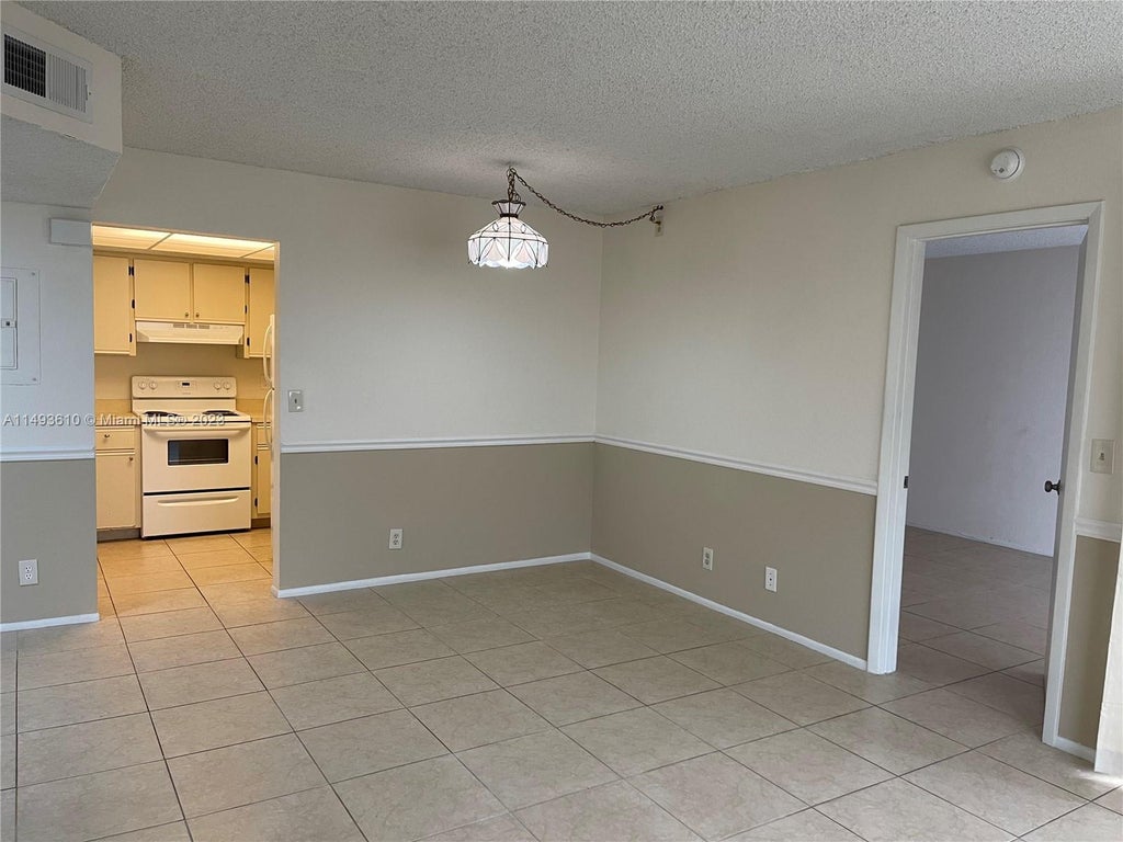 Photo of 1542 SE Royal Green Cir #204, Port Saint Lucie, FL 34952 (MLS # A11493610)