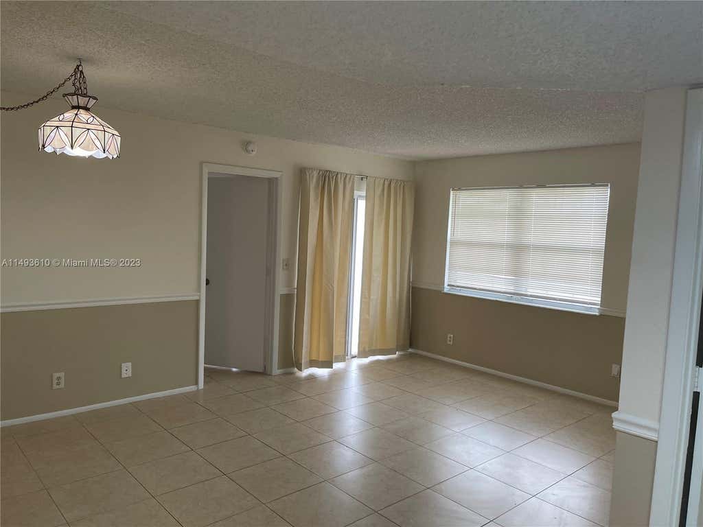 Photo of 1542 SE Royal Green Cir #204, Port Saint Lucie, FL 34952 (MLS # A11493610)