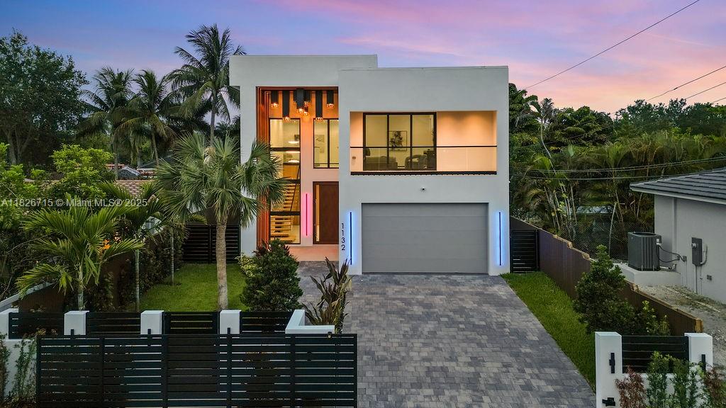 Step into unmatched elegance with this breathtaking new construction masterpiece — a true showstopper that turns heads from the moment you arrive. Boasting 3,828 SQFT, this 4-bedroom, 4.5-bath home blends striking design with top-tier functionality. The dramatic front entrance and soaring ceilings set the tone for luxury throughout. A chef’s dream kitchen with high-end finishes flows seamlessly into expansive living spaces. Outside, indulge in a private resort-style retreat with a heated pool, spa, summer kitchen, and oversized backyard. With custom accent walls, built-in speakers, and security cameras already in place, this home is move-in ready. From the elegant lighting to the flawless craftsmanship, every inch exudes sophistication. Don’t miss your chance — owner financing available!